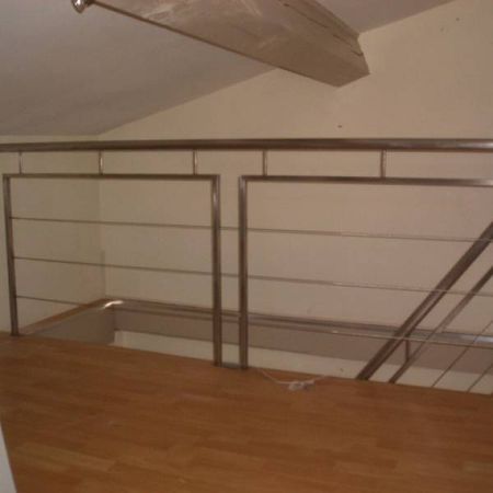 Conception de rampe d'escalier moderne en inox dans les Bouches du Rhône
